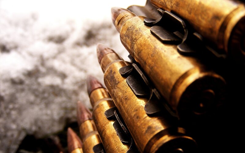 Ammunition in Snow — Dramatic, Black