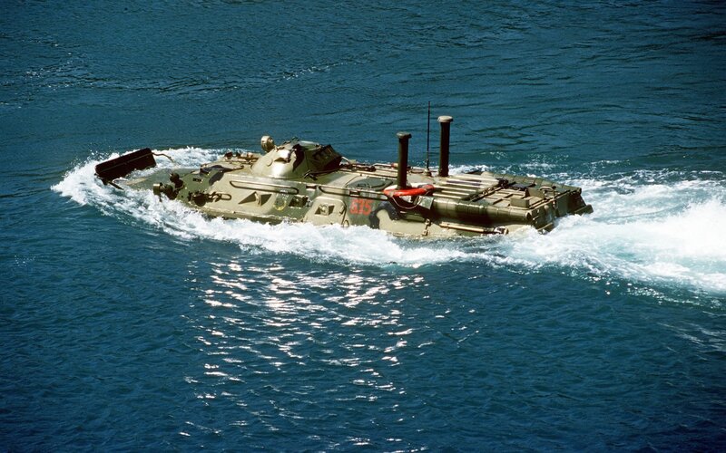 Amphibious armored vehicle in water