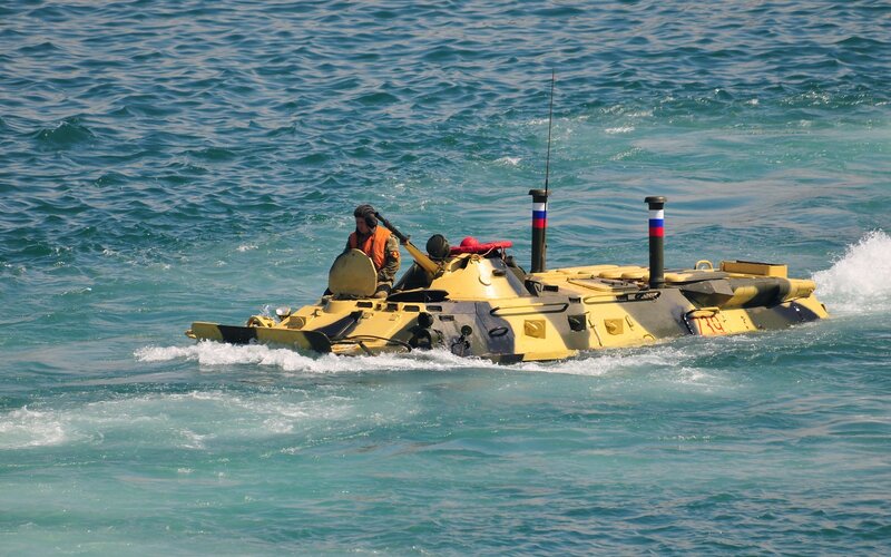 Amphibious armored vehicle in water