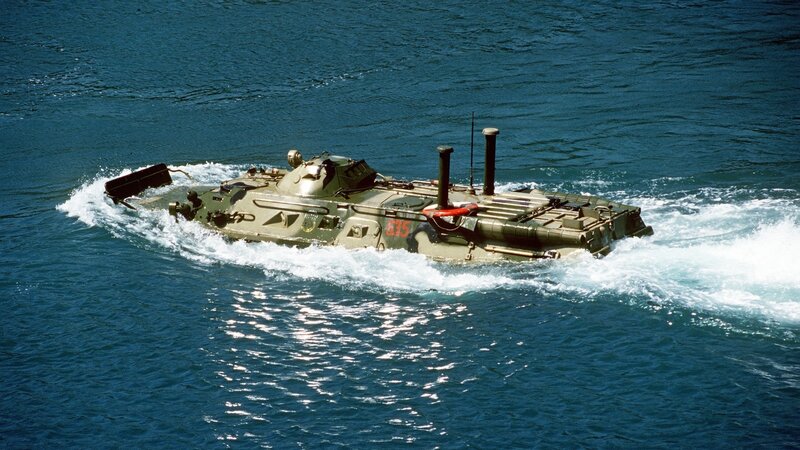 Amphibious armored vehicle in water