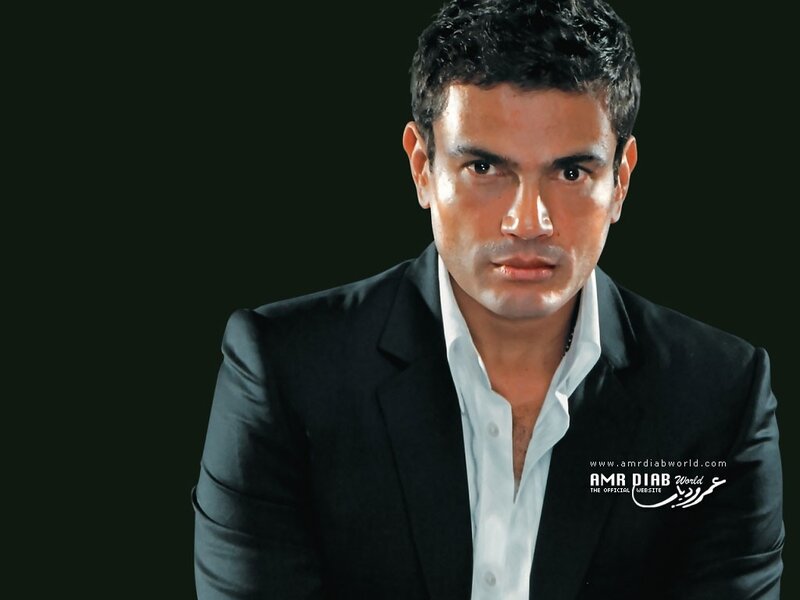 Amr Diab in a black suit