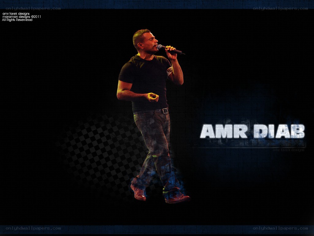 Amr Diab performing on stage