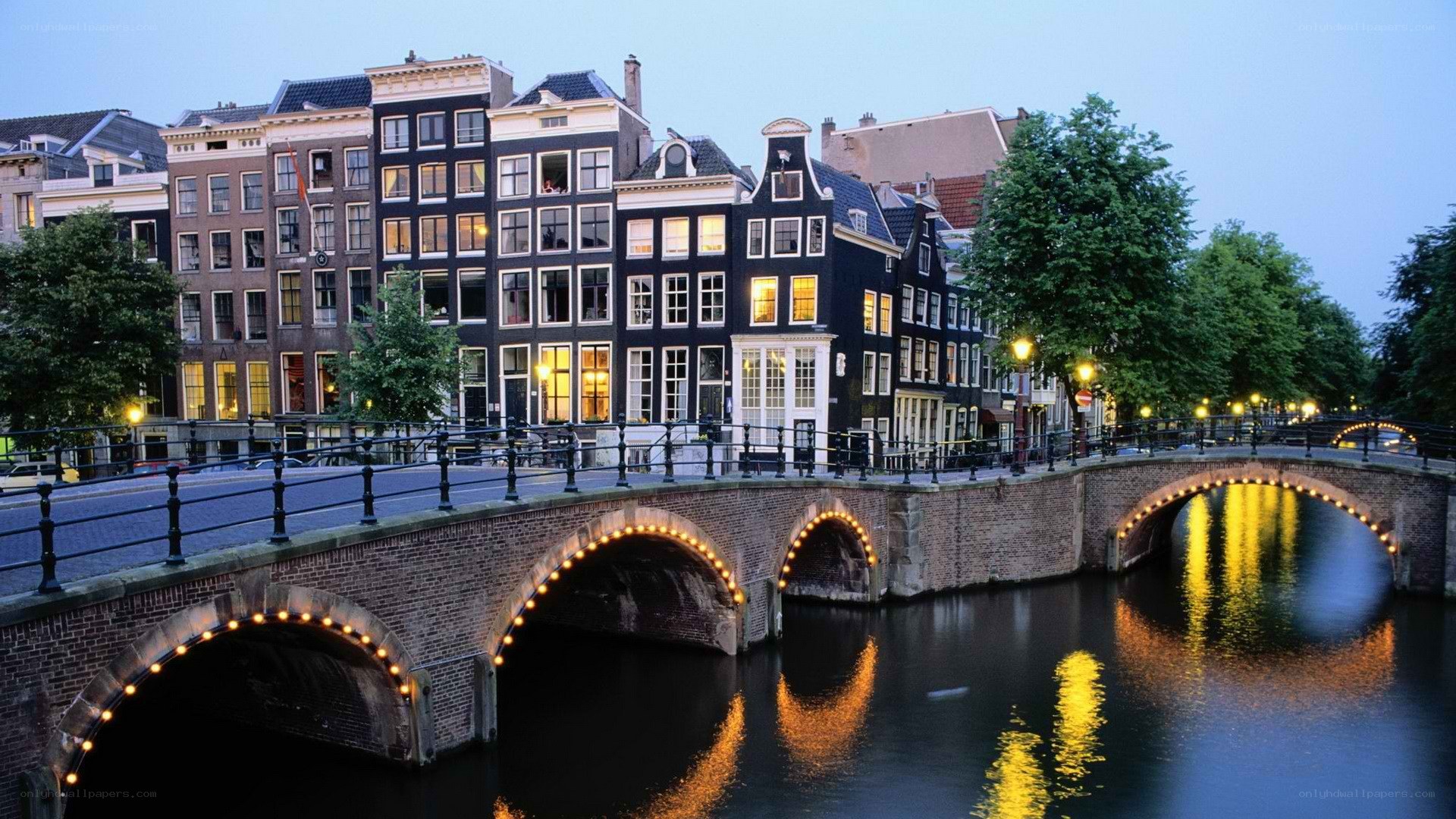 Amsterdam canal bridge at dusk