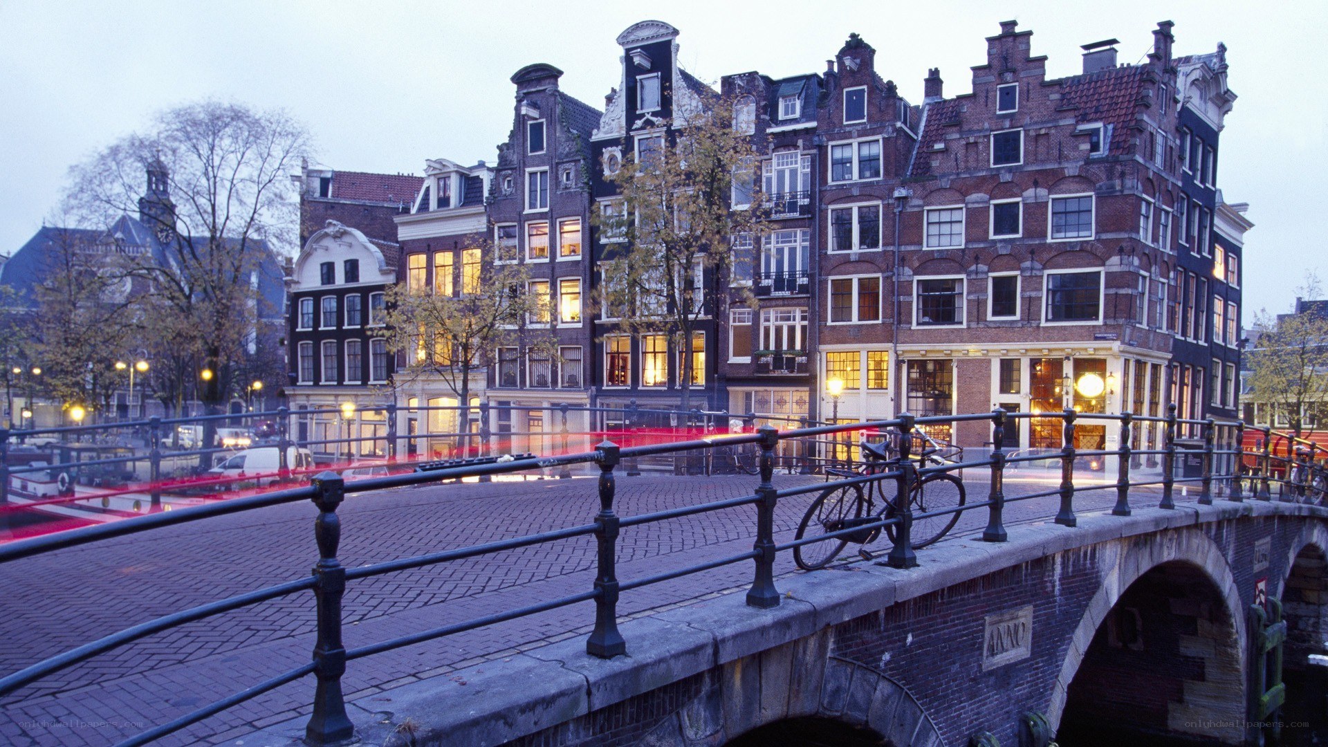 Amsterdam canal bridge at dusk