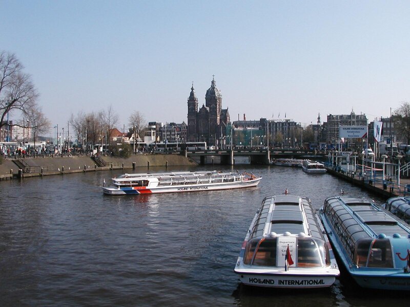 Amsterdam canal with boats