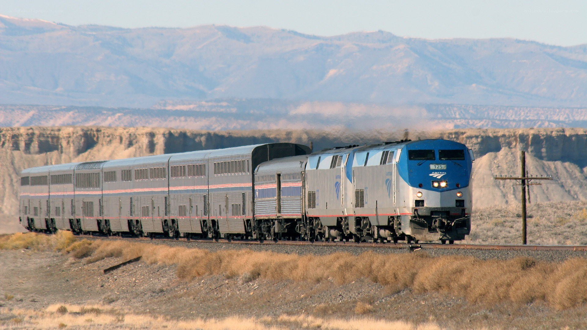 Amtrak train in desert landscape