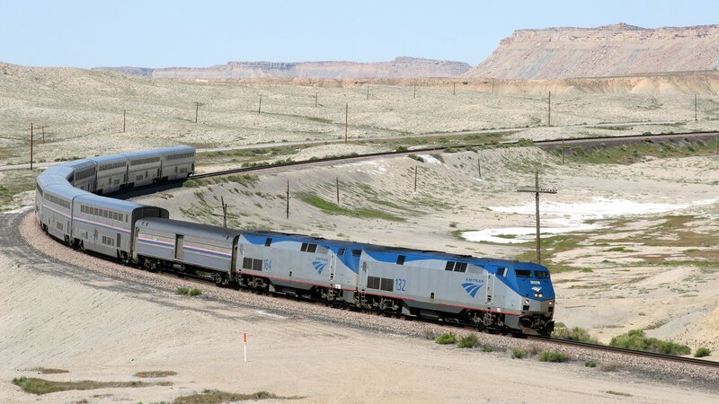 Amtrak train in desert landscape