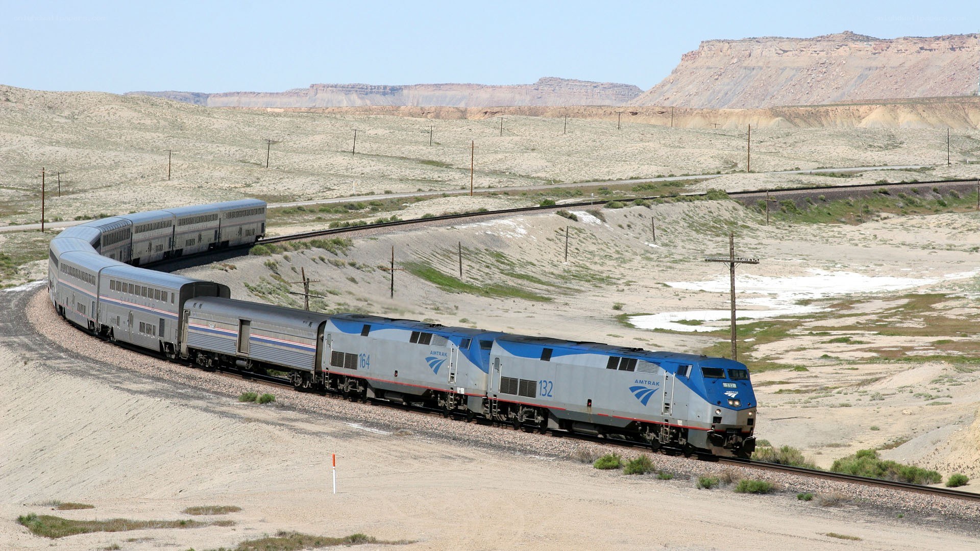 Amtrak train in desert landscape
