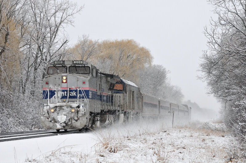 Amtrak train in snowy landscape