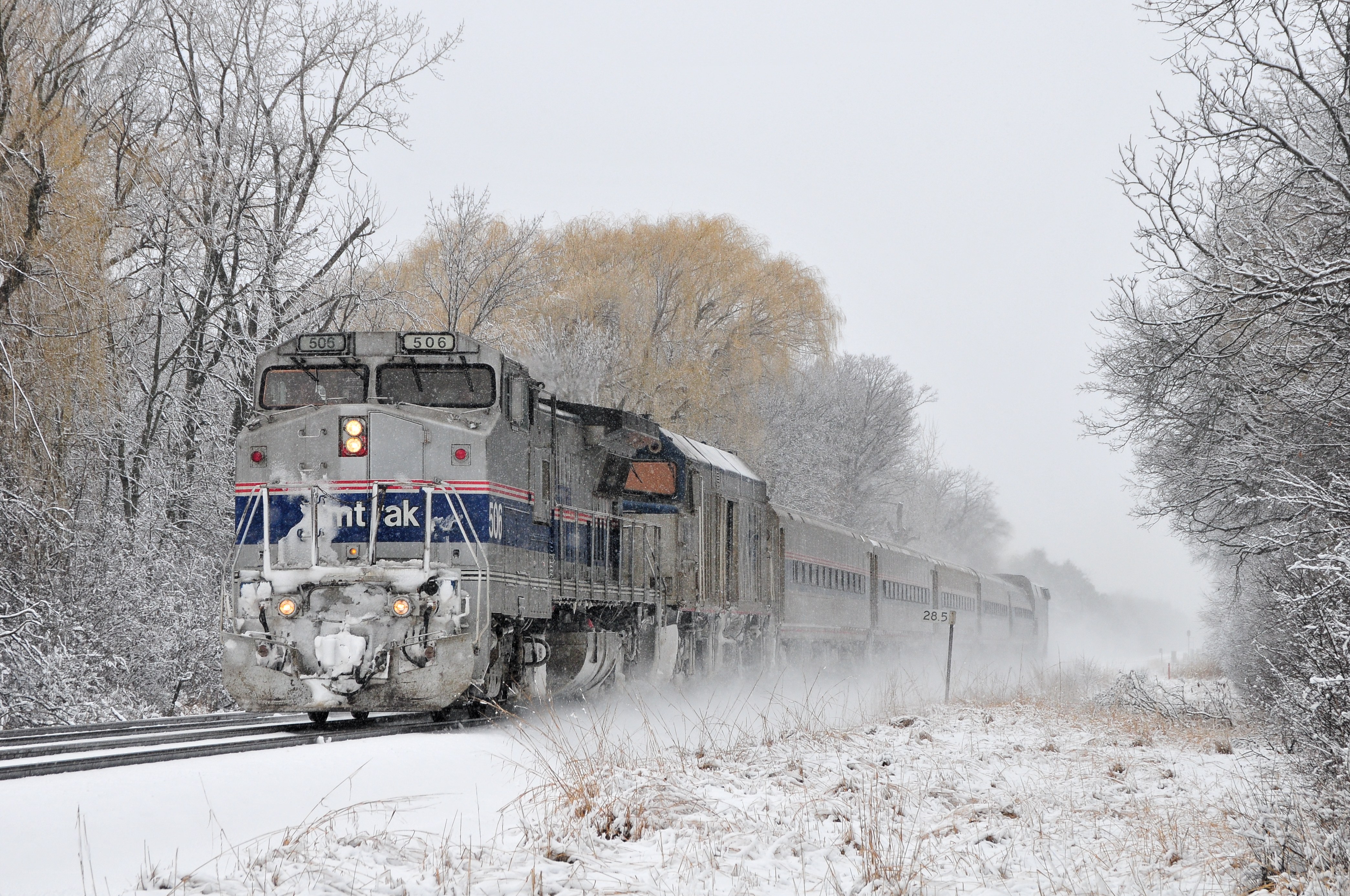 Amtrak train in snowy landscape