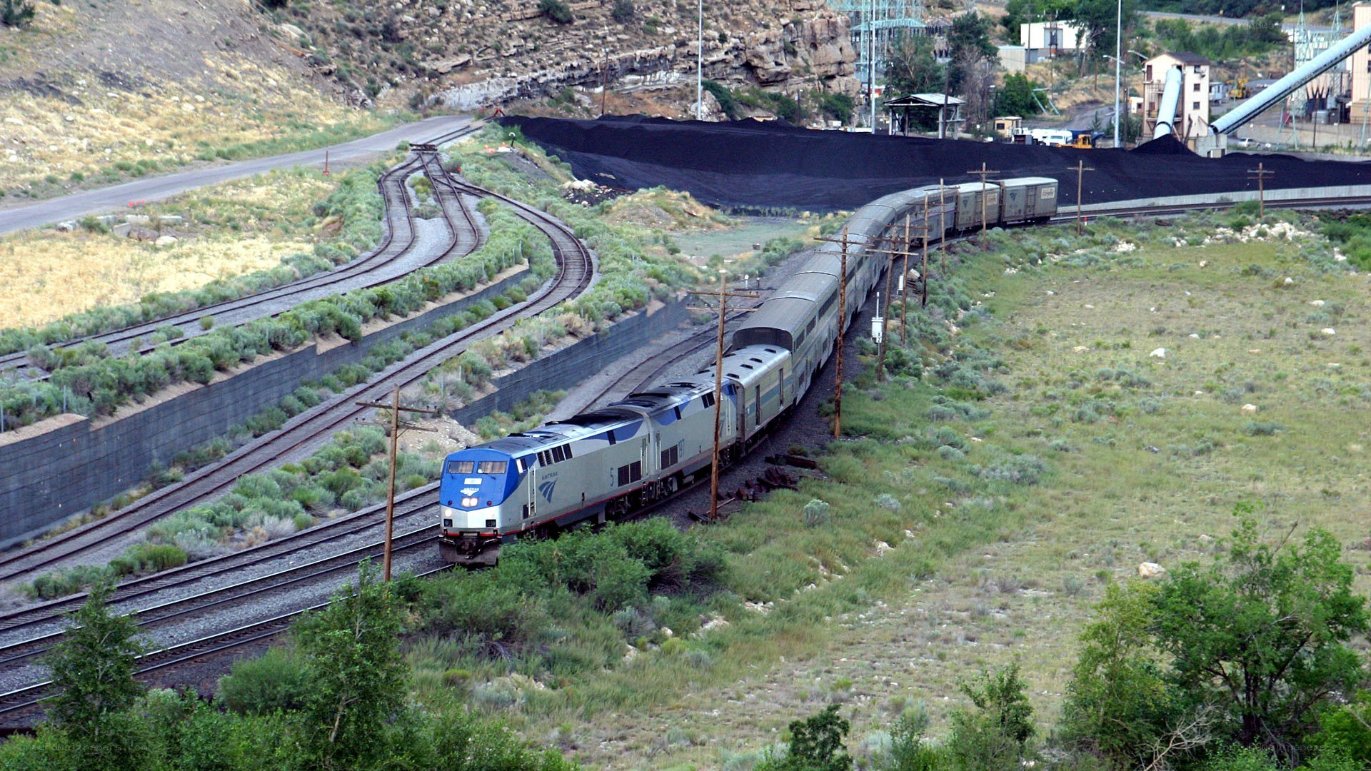 Amtrak train on curved tracks