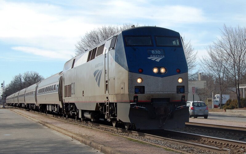 Amtrak Train on Tracks — Blue, Calm, Winter