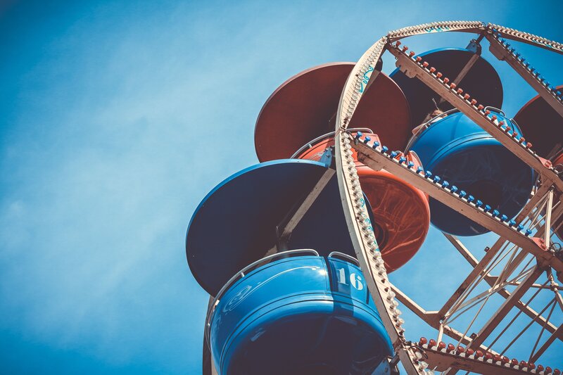 Amusement park ride against blue sky