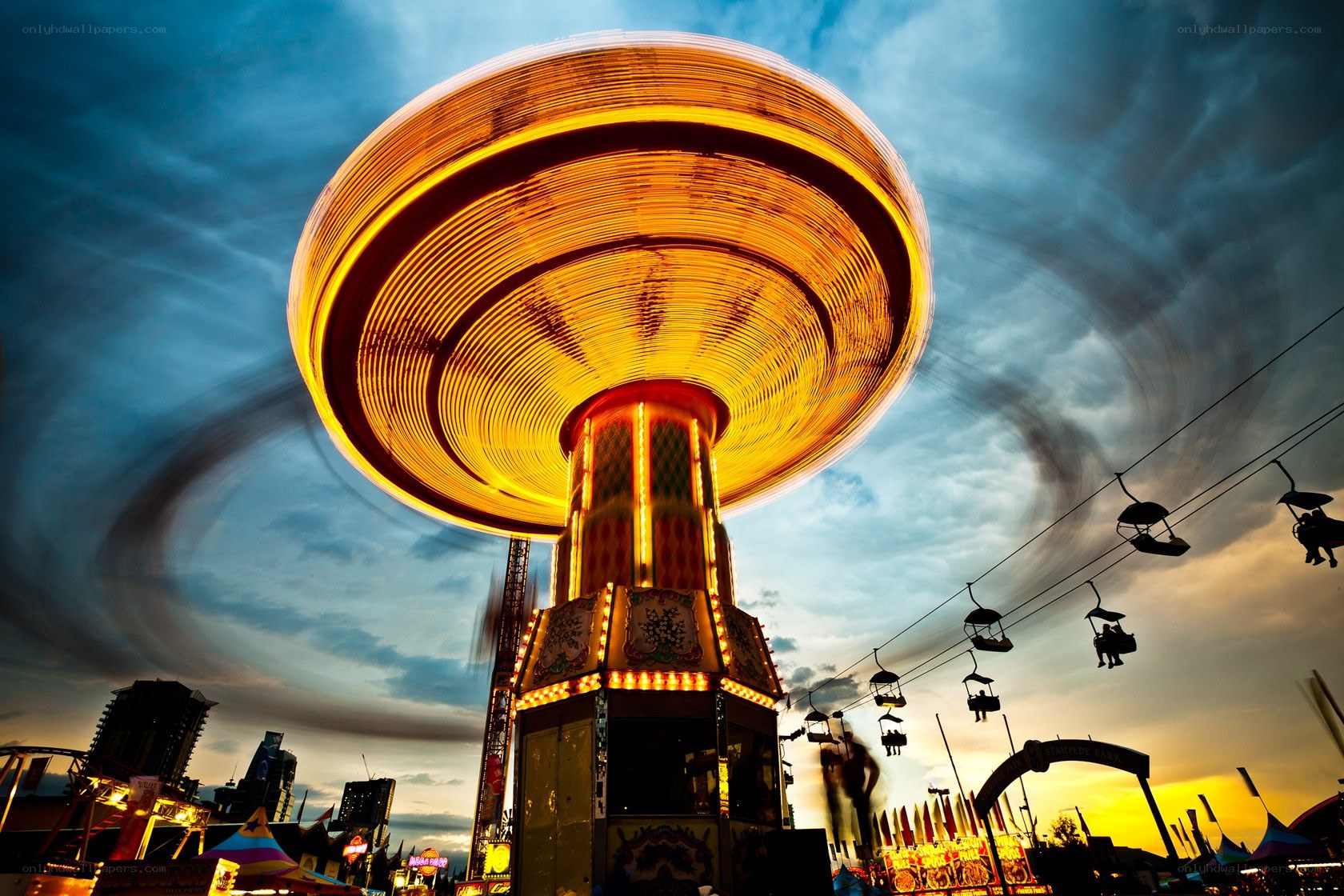 Amusement park ride at dusk