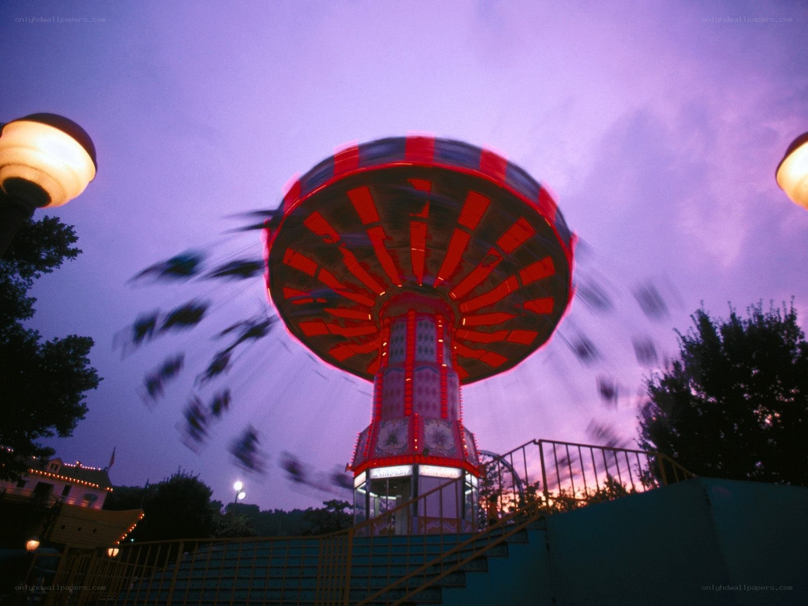 Amusement park ride at dusk