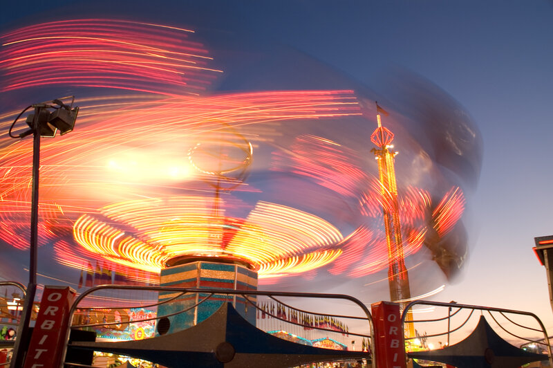 Amusement park ride at dusk