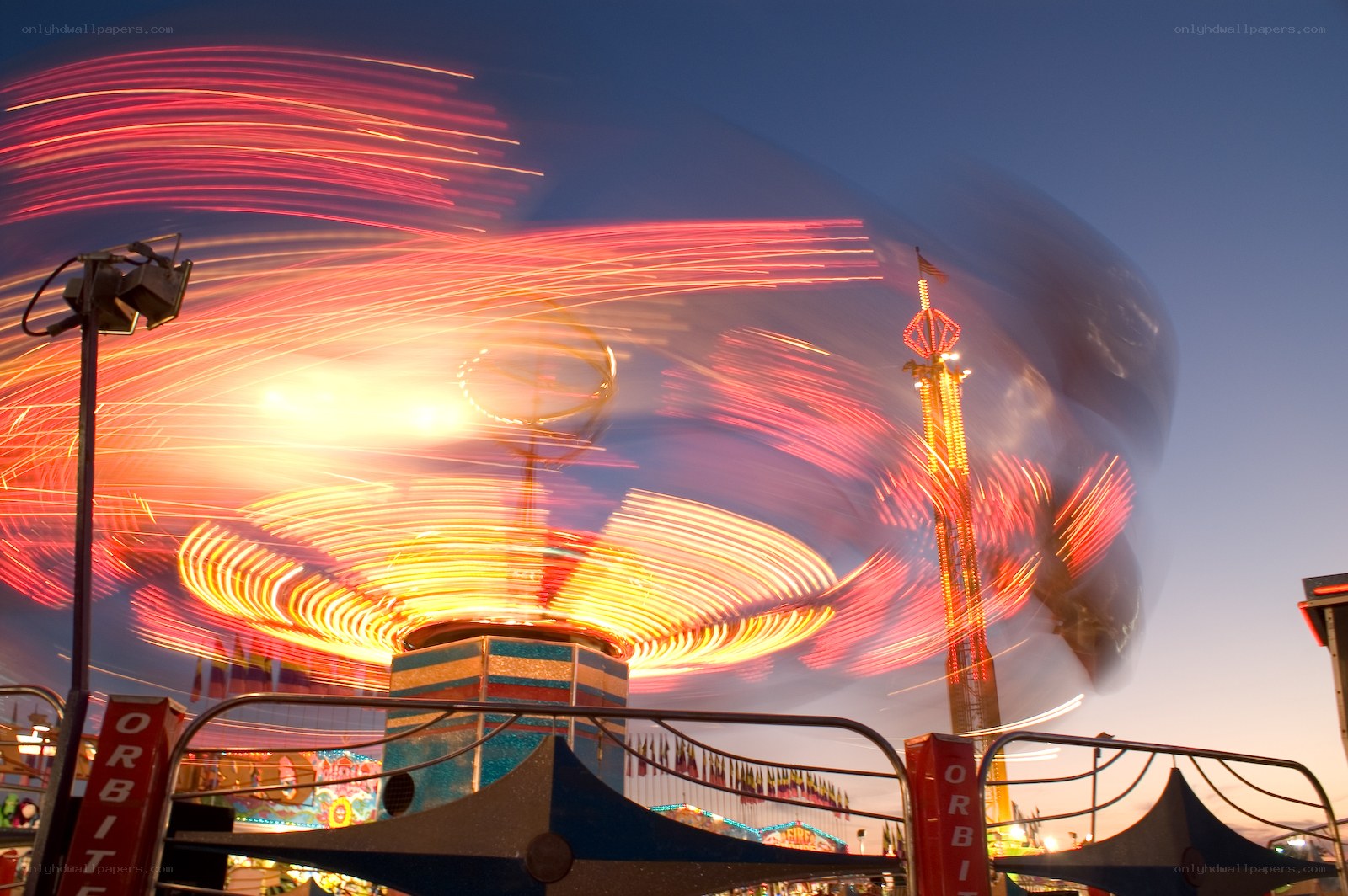 Amusement park ride at dusk