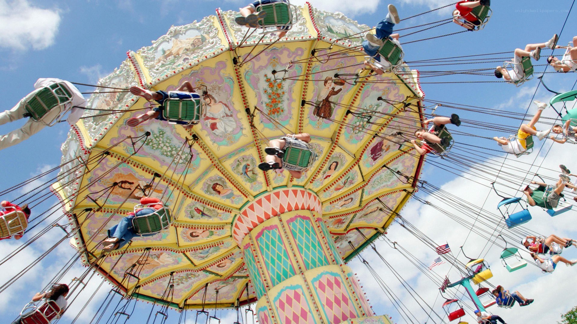 Amusement park swing ride