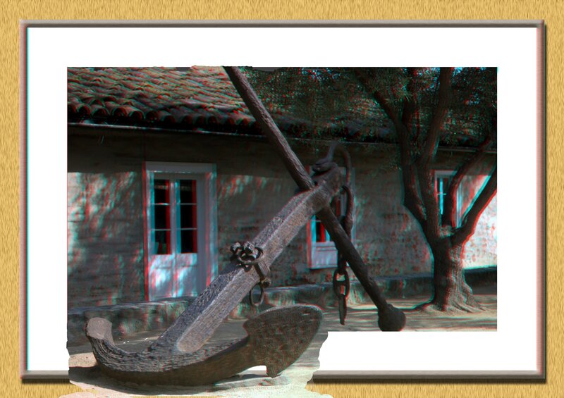 Anchor in front of stone building