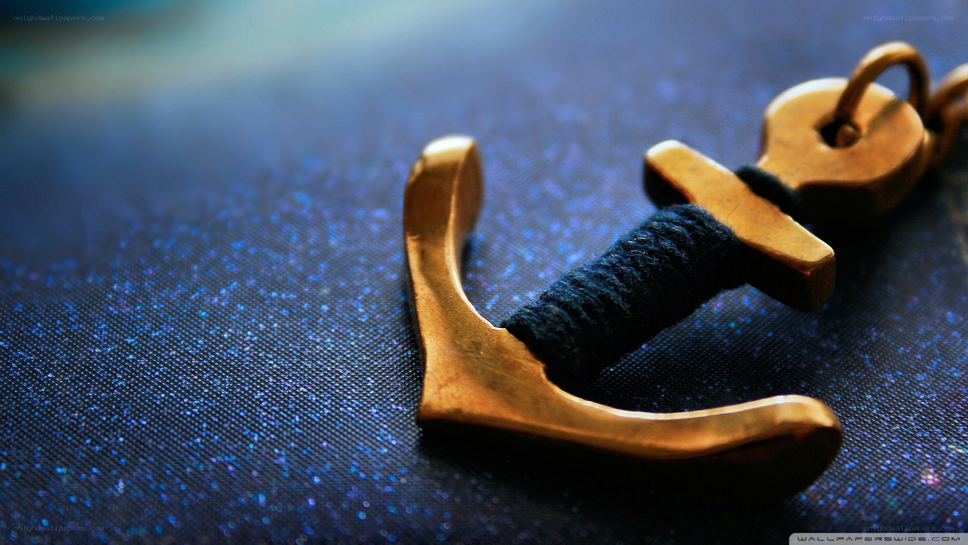anchor keychain on blue fabric