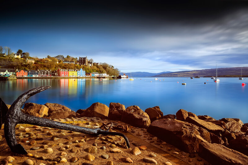Anchor on Rocky Shore — Blue