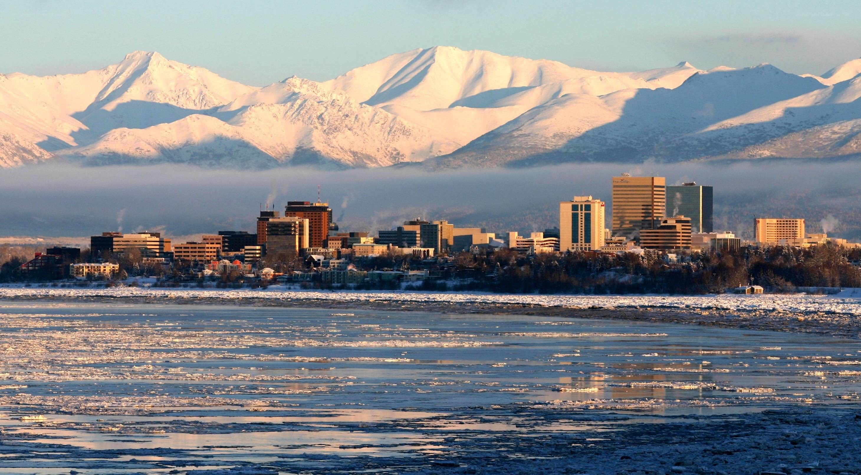 Anchorage cityscape with snow-capped mountains