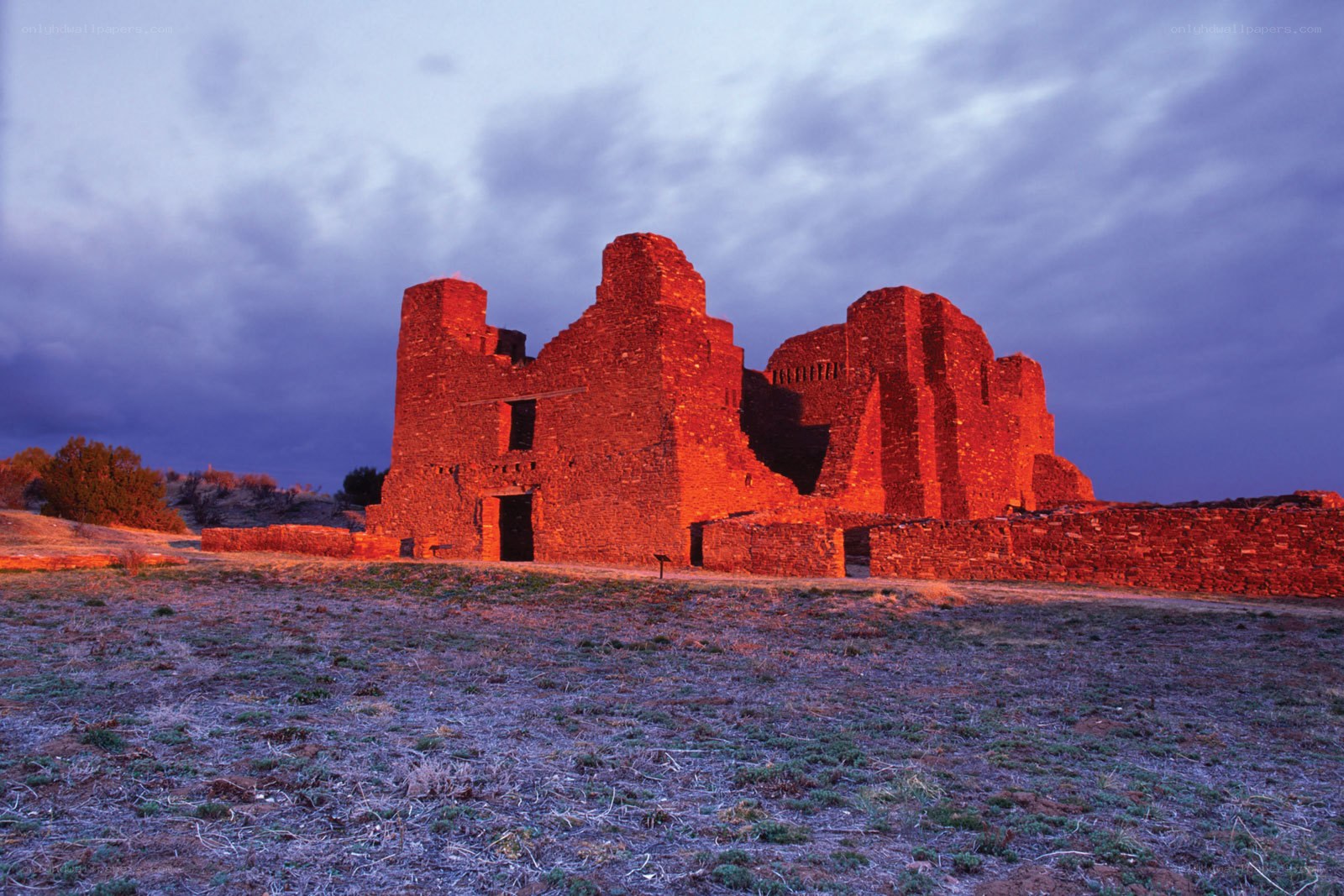 ancient adobe ruins at dusk