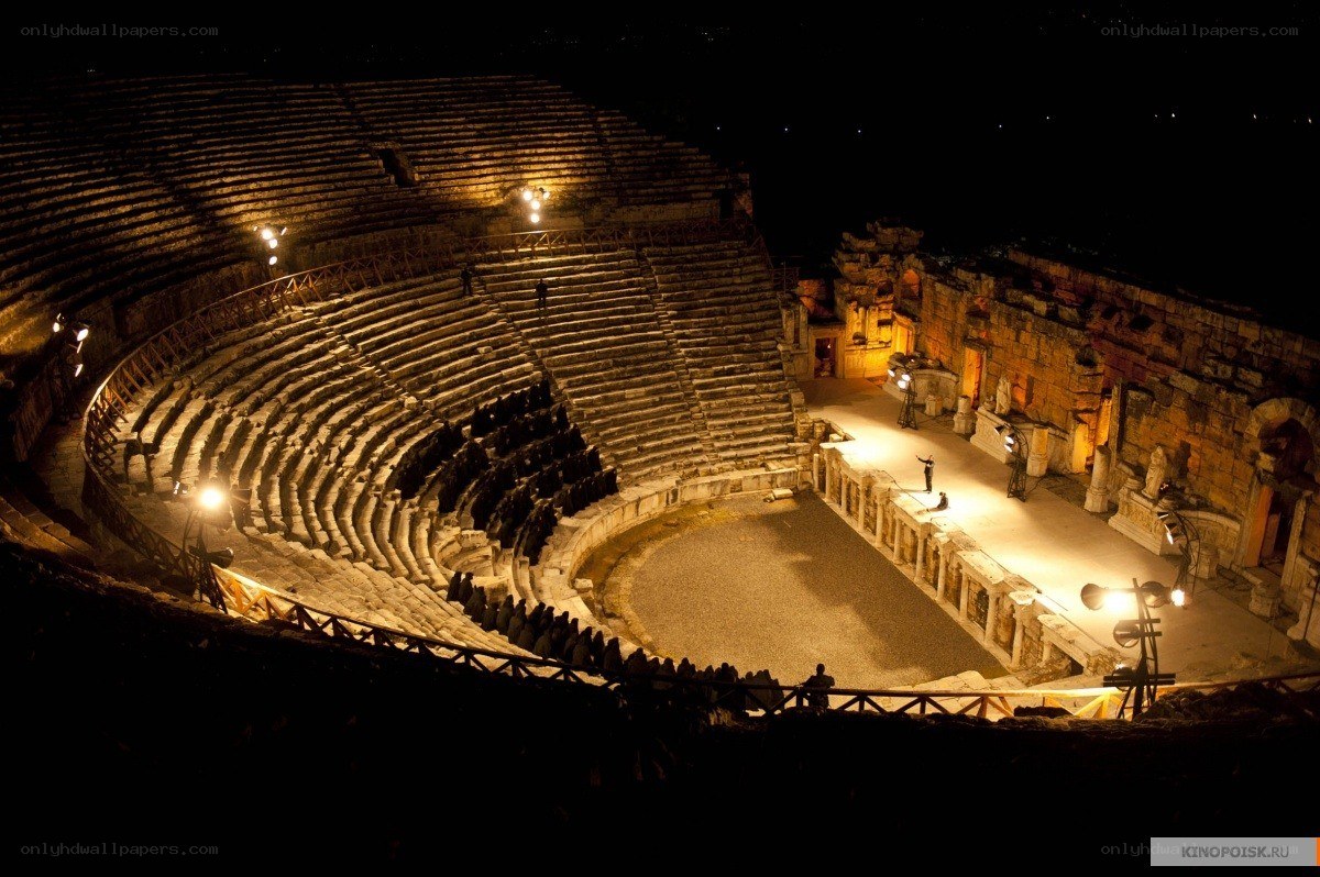 Ancient amphitheater at night