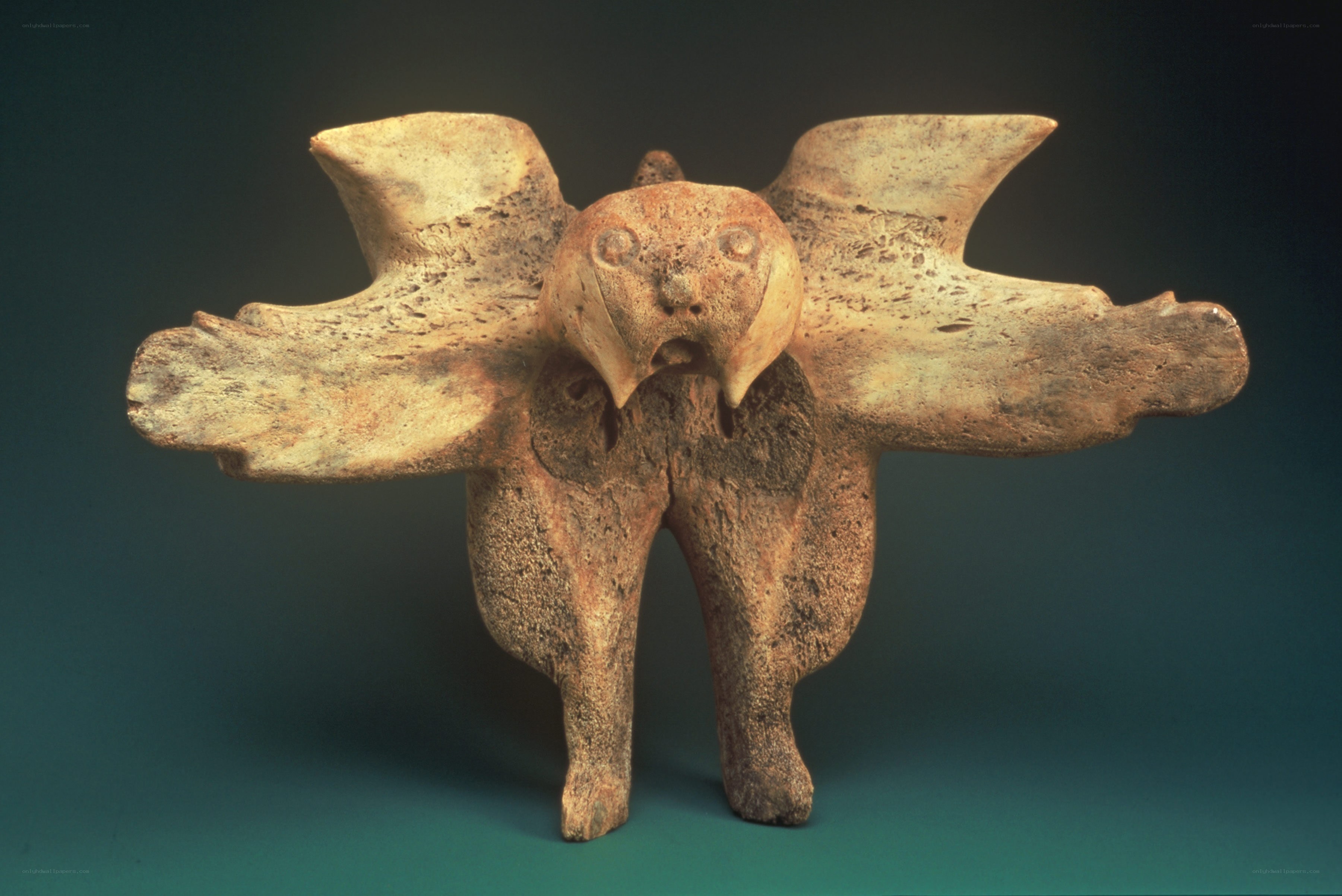 ancient bird-like sculpture