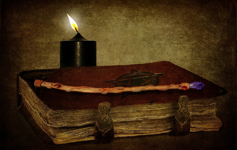 Ancient Book with Wand