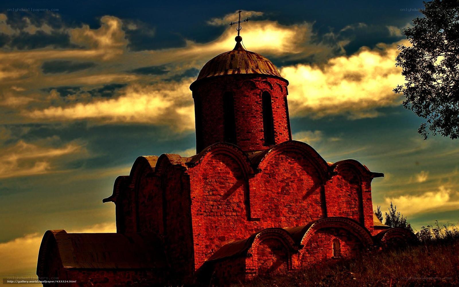 Ancient brick church at sunset