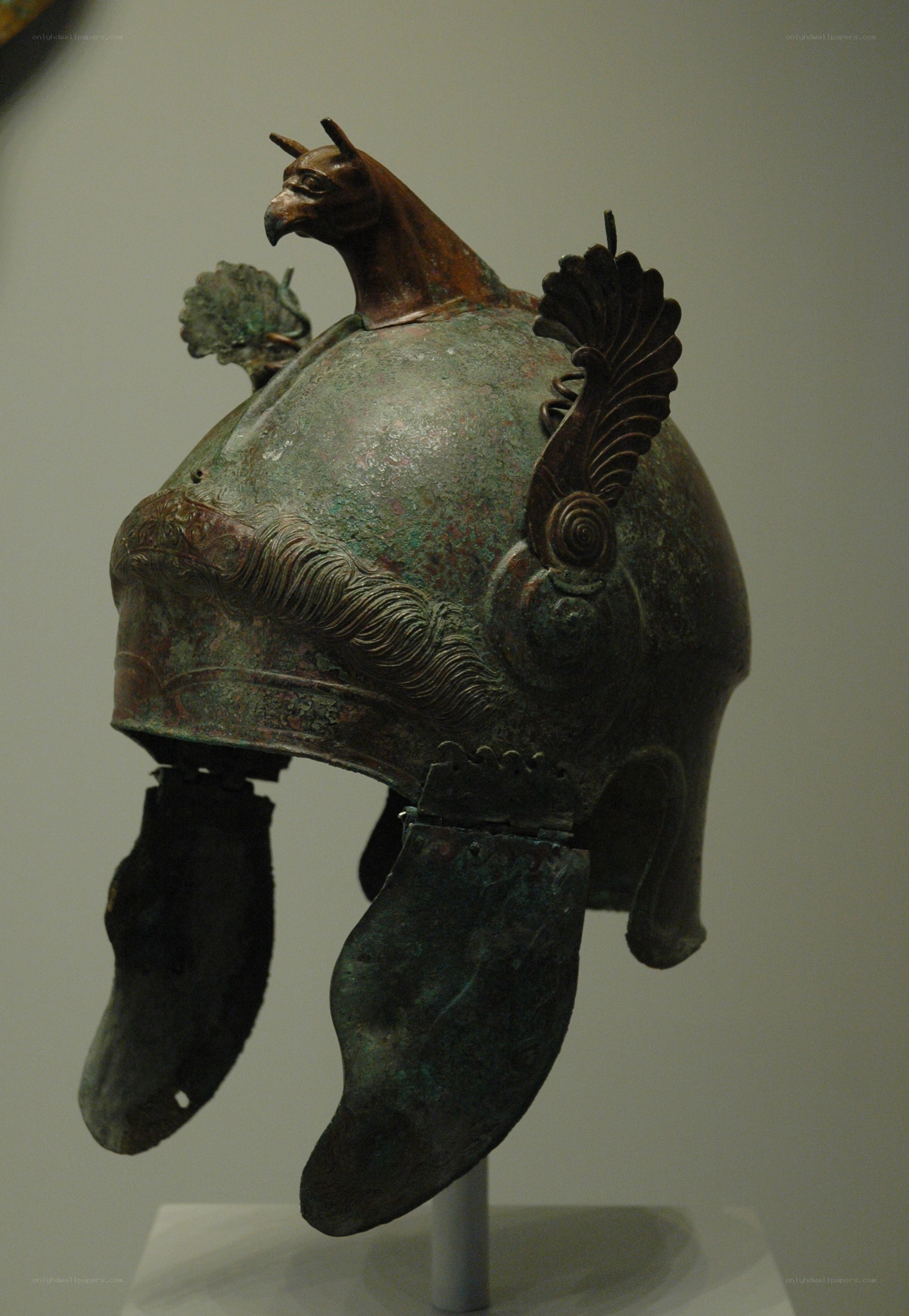 ancient bronze helmet with griffin
