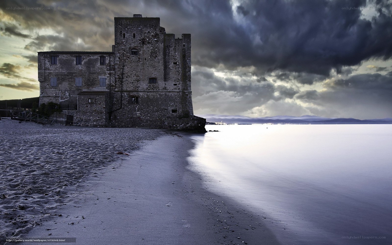 Ancient castle on a stormy beach