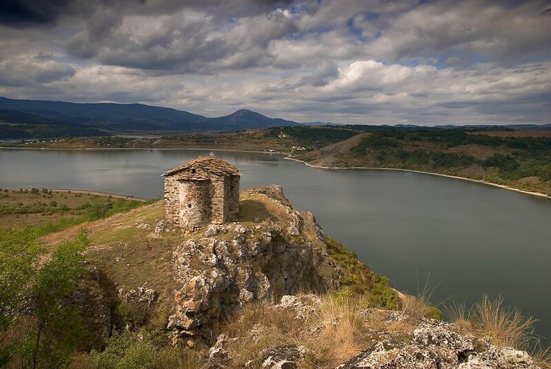 Ancient chapel by a lake