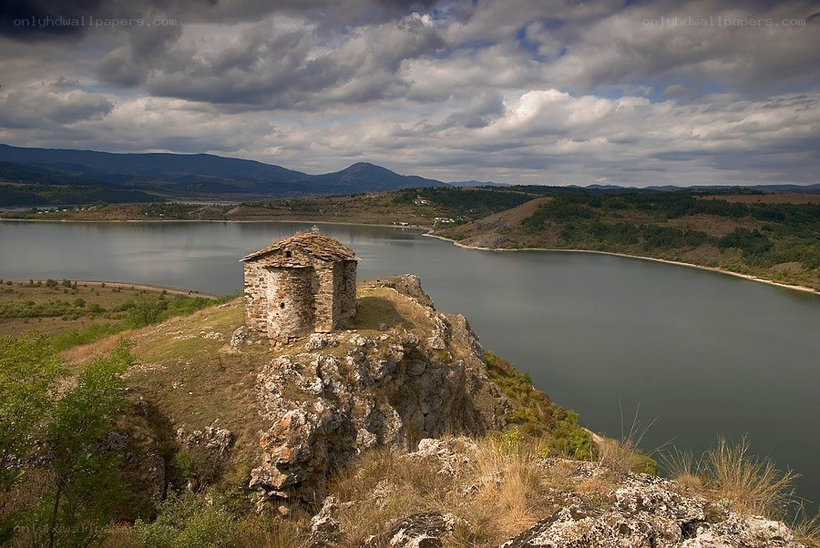 Ancient chapel by a lake
