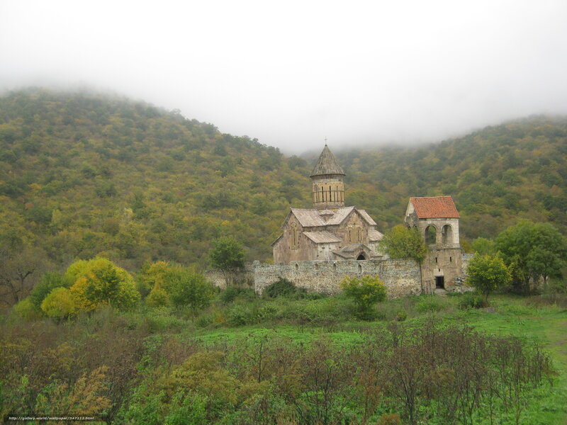 Ancient church in misty valley