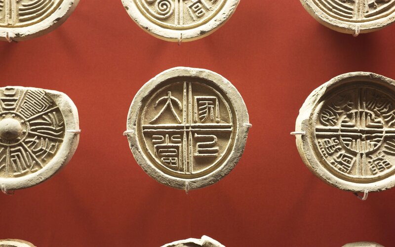 ancient circular artifacts on display
