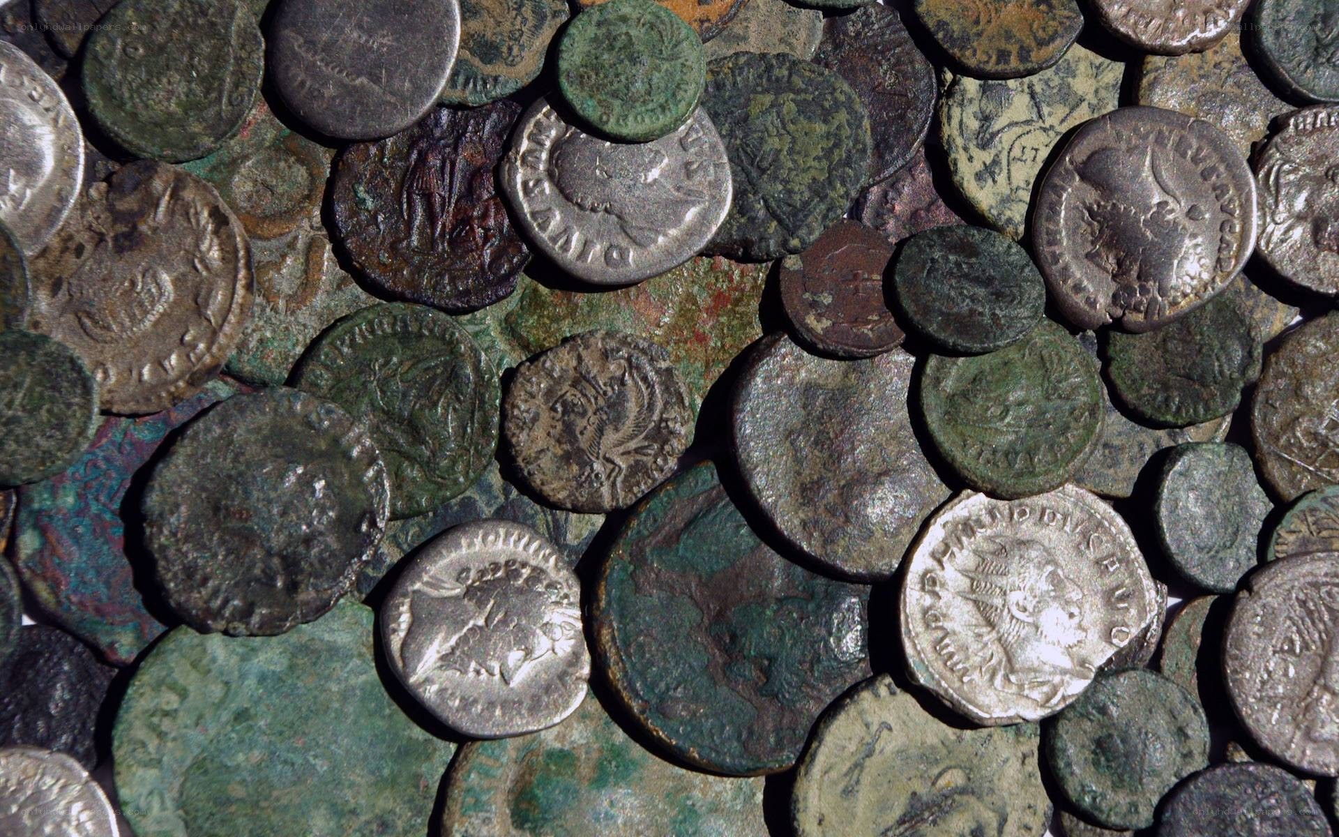 ancient coins in a pile