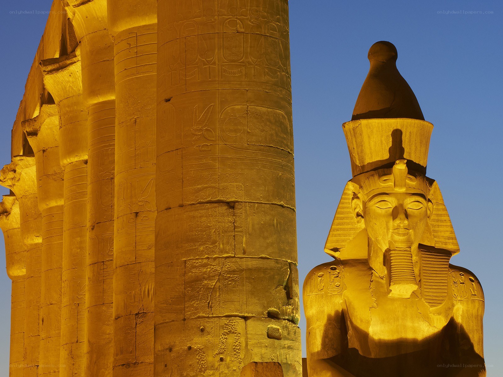 Ancient Egyptian statue and pillars