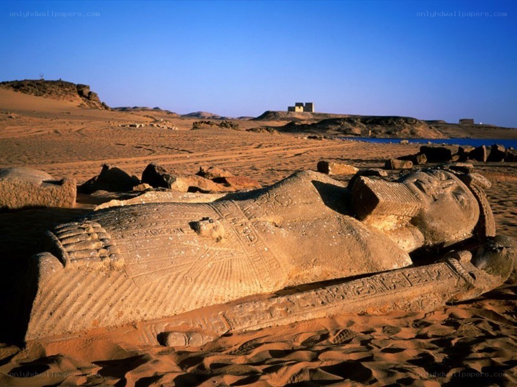 Ancient Egyptian statue in desert