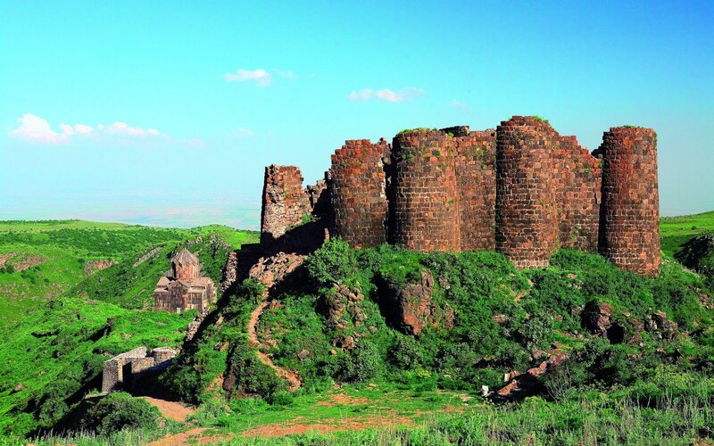 Ancient fortress on a green hill