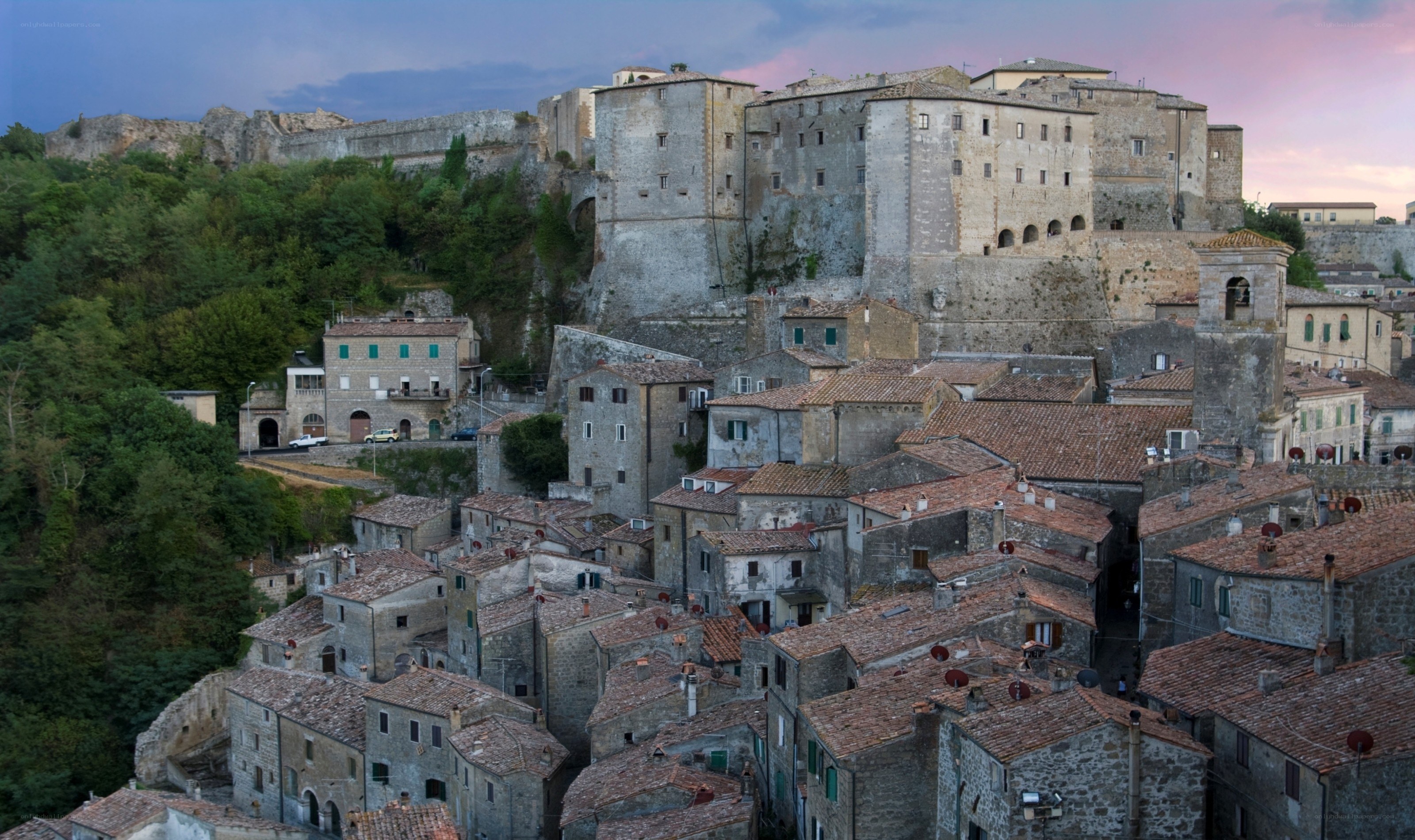 ancient hilltop town at dusk