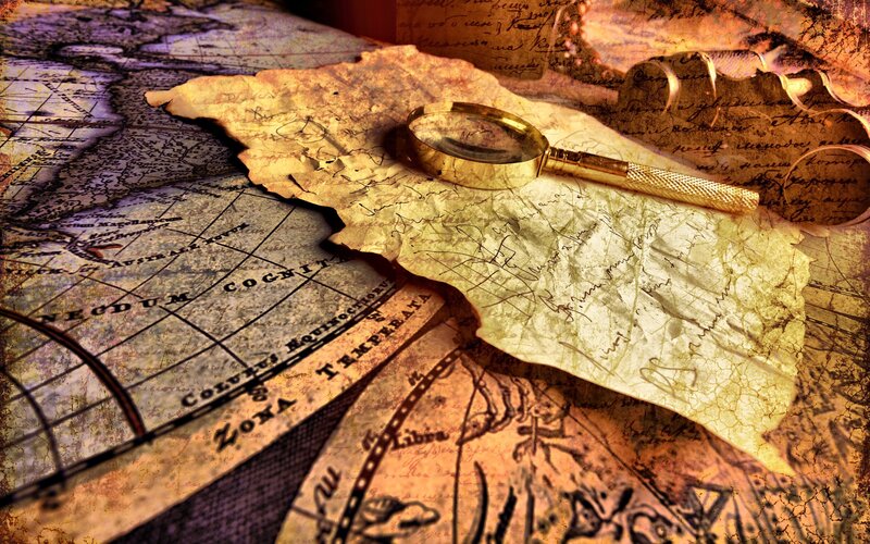 ancient map and magnifying glass