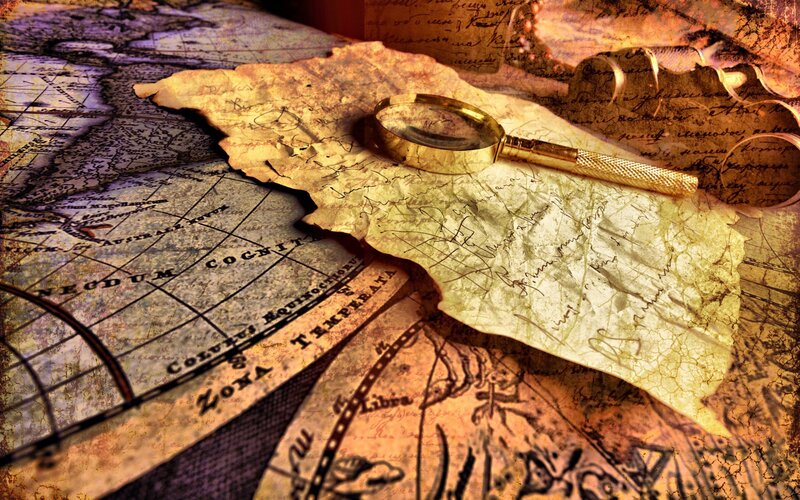 Ancient Map with Magnifying Glass