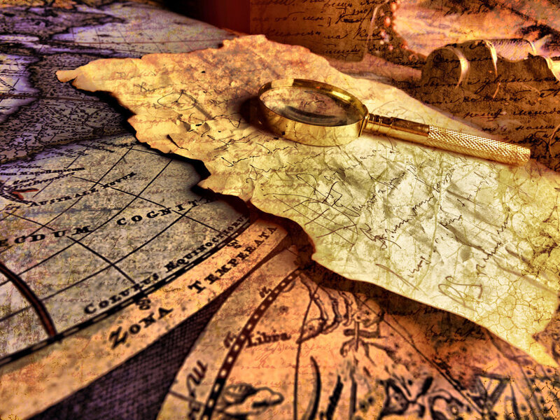 Ancient Maps and Magnifying Glass