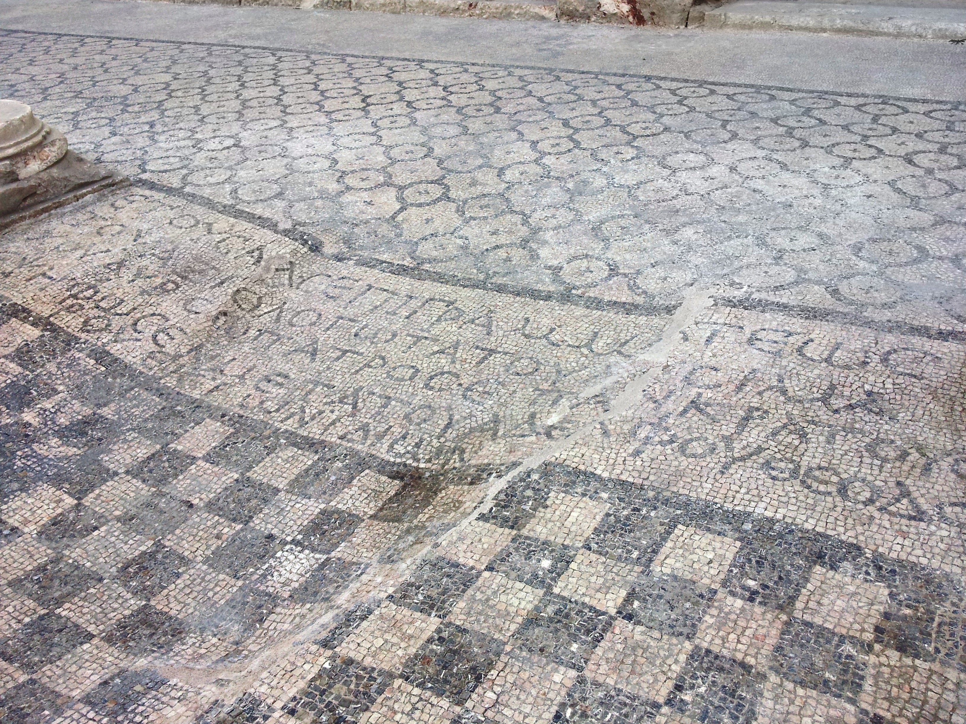 ancient mosaic floor with inscriptions