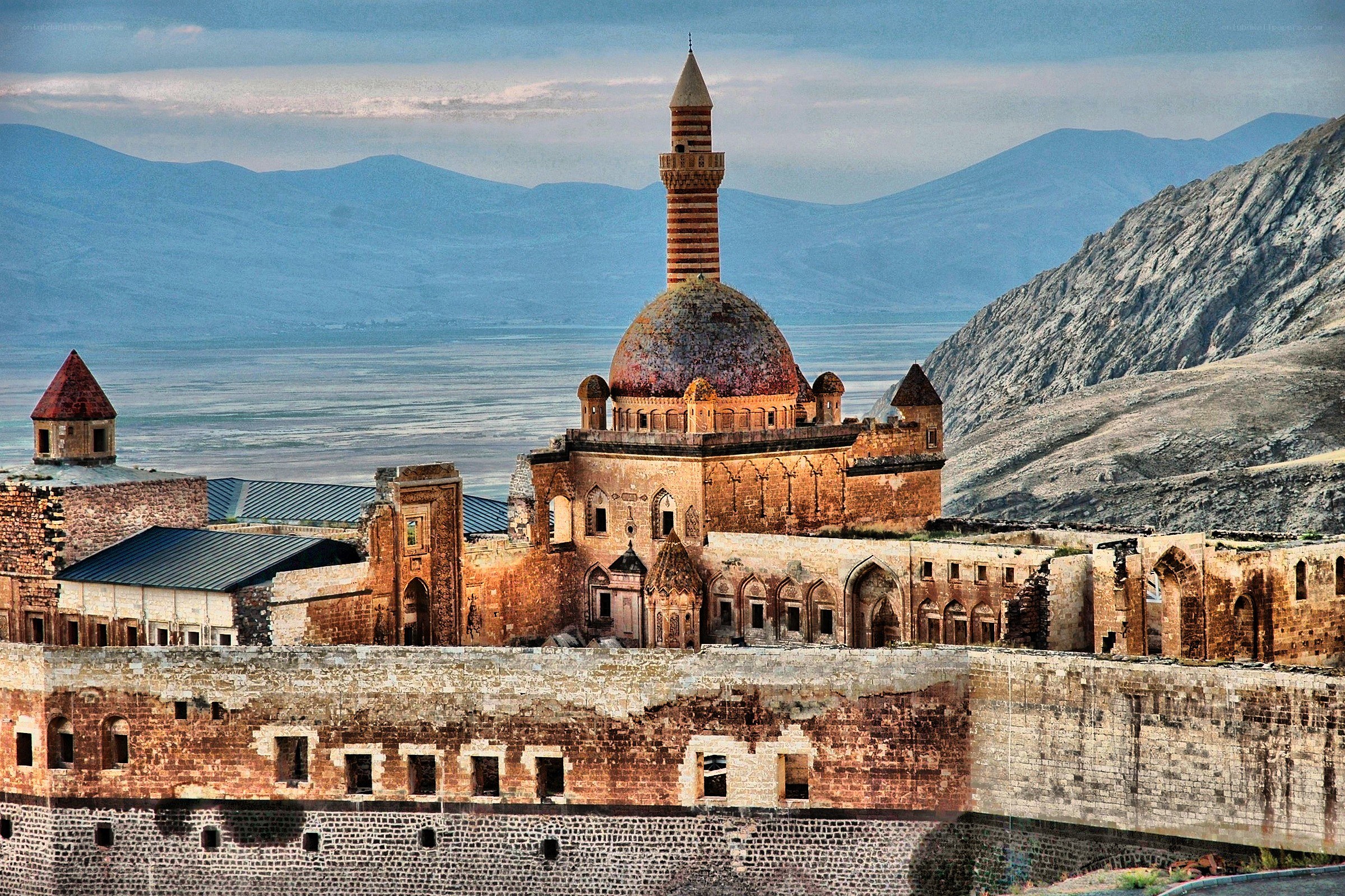Ancient mosque in mountainous landscape