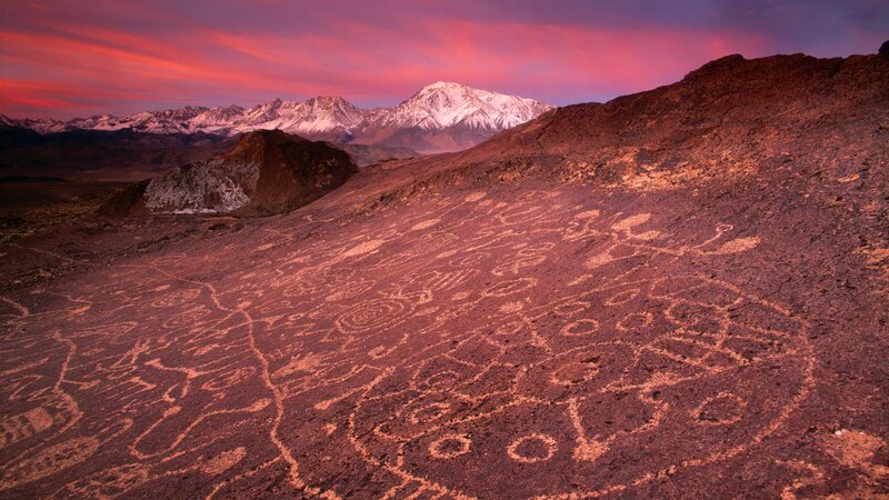 Ancient petroglyphs at sunset