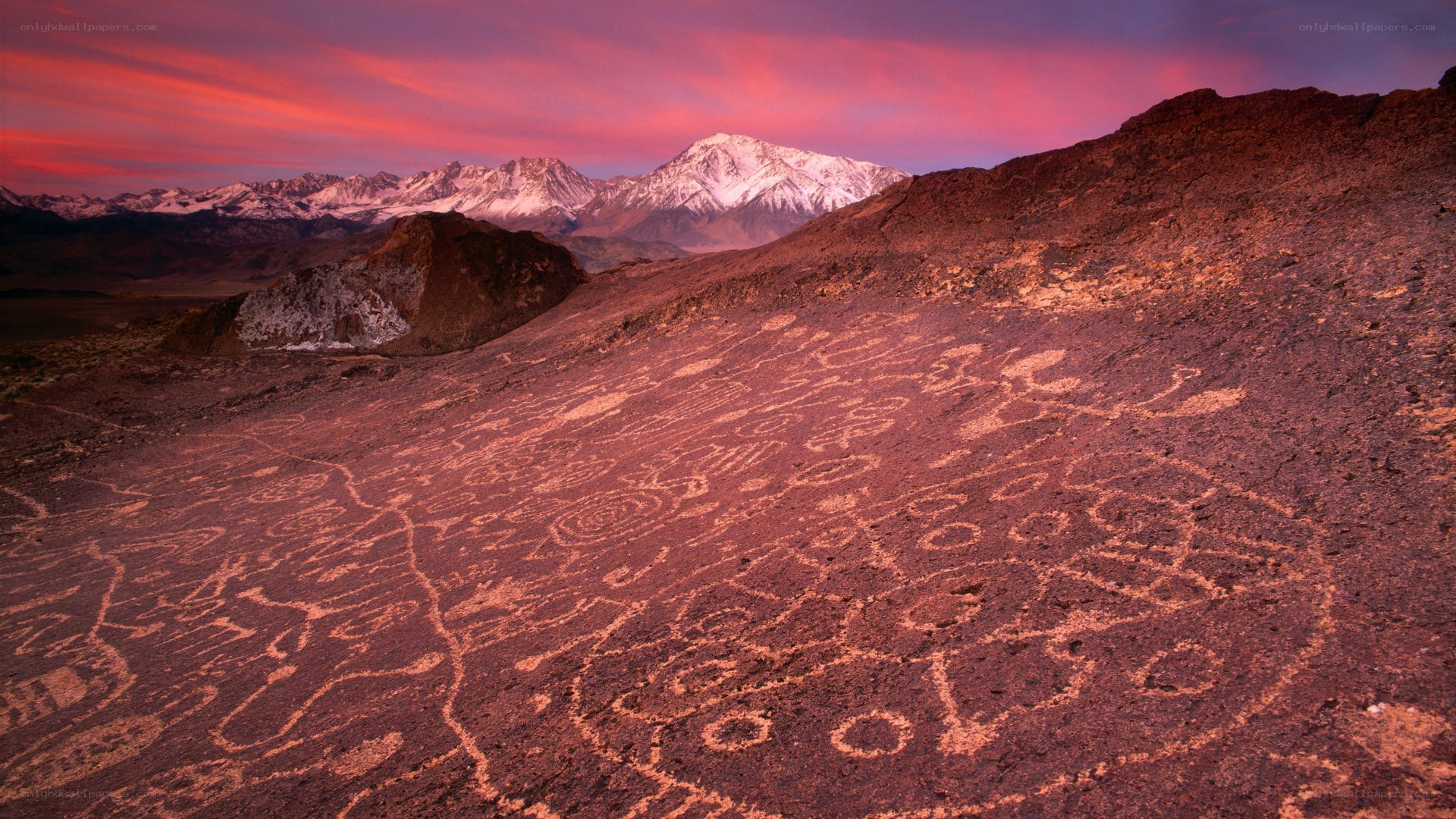 Ancient petroglyphs at sunset