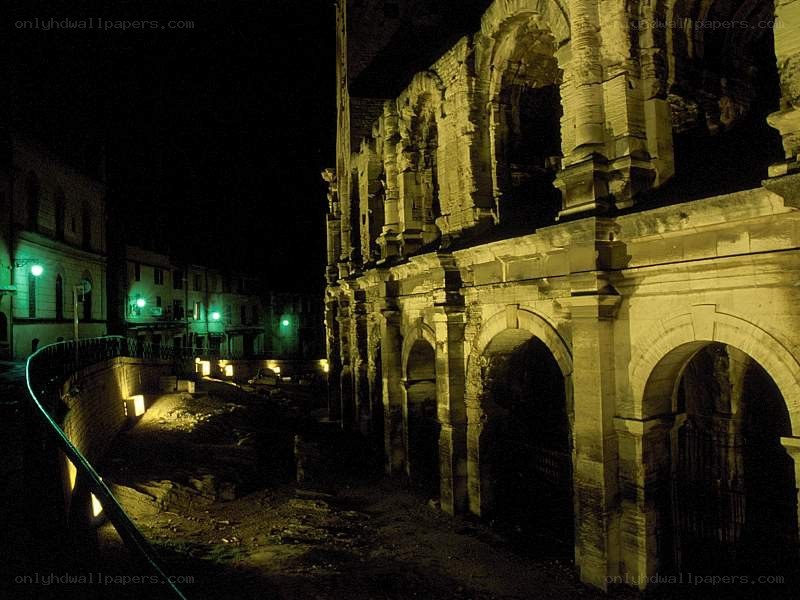 Ancient Roman amphitheater at night